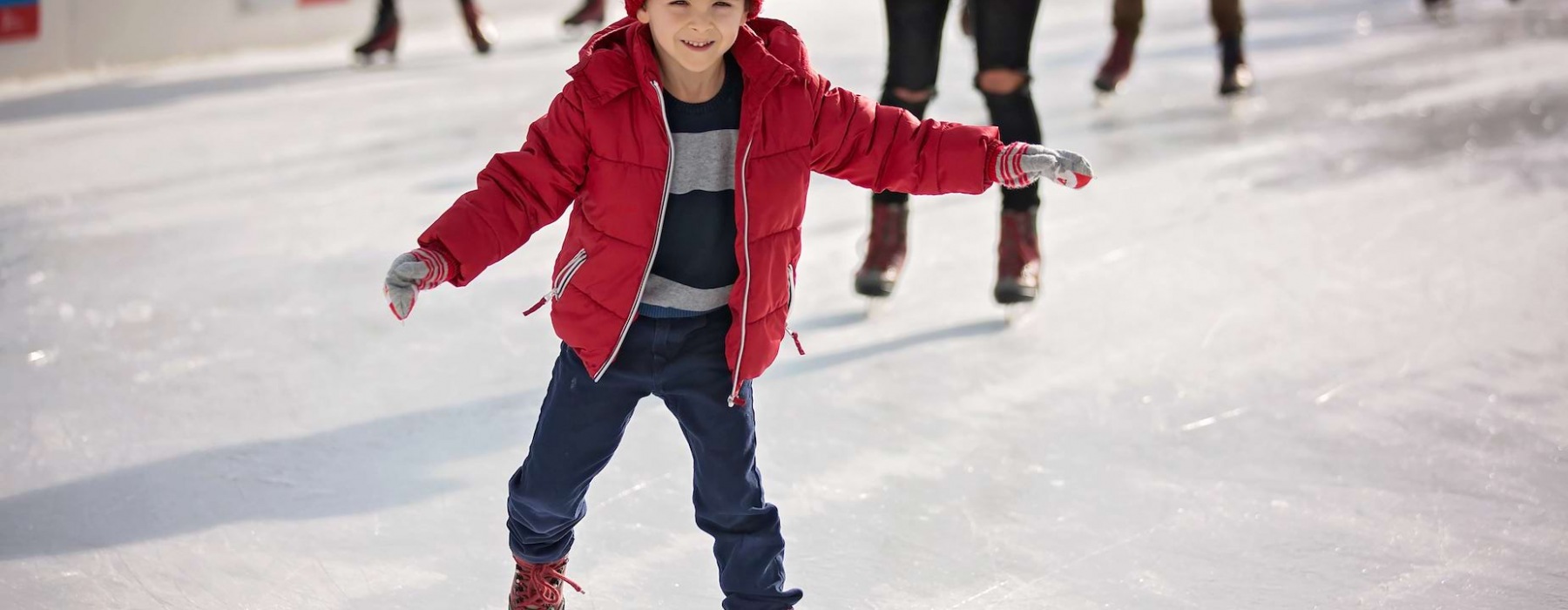 A little boy skating during winter in Pensacola 